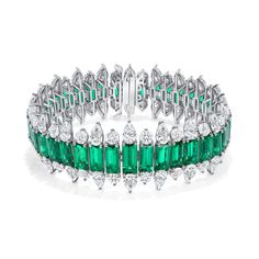 These emeralds create a continuous band of rich, vibrant color that graces your wrist like a lush garden. Intertwined with the emeralds are 40 pear-cut diamonds, additionally, 40 brilliant round diamonds, add a mesmerizing play of light and sparkle to the bracelet. AGL Certification #1126601. 40 x 0.60CT Emerald cut Emeralds (24CTS) 40 x 0.30CT Pear Cut Diamonds - D Color, VVS1-VS1 Clarity (12CT) 40 x 0.21CT Brilliant Round Diamond (8.40CT) Emerald Bracelets, Bracelet Emerald, Emerald Bracelet, Pear Cut Diamond, Expensive Jewelry, Lush Garden, Emerald Jewelry, Stunning Jewellery, Dream Jewelry