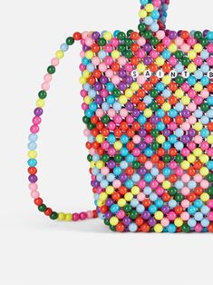 Introducing our Beaded Small Bag a charming accessory that seamlessly blends style and functionality. This petite bag, intricately crafted entirely from vibrant beads, is not only a visual delight but also a practical companion for your essentials, including your smartphone. The stunning design features a myriad of color combinations, creating a playful and eye-catching aesthetic. The meticulous beadwork adds a touch of sophistication to this small yet statement-making accessory. The bag is equi Multicolor Beaded Pouch Bag, Multicolor Rectangular Bag With Colorful Beads, Multicolor Rectangular Shoulder Bag With Colorful Beads, Multicolor Beaded Bags For Gifts, Trendy Multicolor Beaded Shoulder Bag, Trendy Multicolor Beaded Bags, Multicolor Beaded Rectangular Shoulder Bag, Multicolor Beaded Shoulder Bag, Big Babol