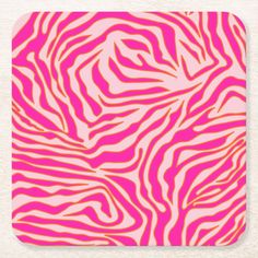 an animal print pattern in pink and orange on a white background that looks like zebra stripes