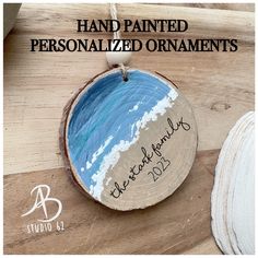 a hand painted wooden ornament with the words,'hand painted personalized ornaments '