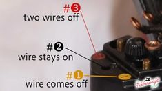 an electrical device with two wires off and one wire attached to the other, labeled in red