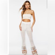 Forever 21 | Cream/White Crochet Flare Beach Pant Cover Up With Brown Crochet Design At The Bottom, Size Large. White Fitted Bottoms For Beach Party, Fitted White Bottoms For Beach Party, Forever 21 White Spring Bottoms, White Bohemian Pants For Beach Season, White High Waist Beachwear Pants, White High Waist Pants For Beachwear, White High-waist Pants For Beachwear, Forever 21 Bottoms For Beach Vacation, White High-waist Bottoms For Beach Party