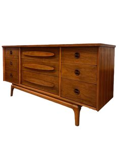 a large wooden dresser with drawers on it