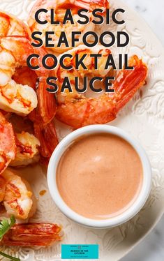 the cover of classic seafood cocktail sauce on a white plate with shrimp and dipping sauce