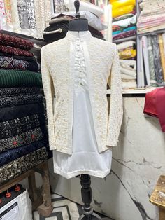 *3 Piece  White ,  Kurta, Pant, and Jacket  *Fabric: %100 Georgette, Satin, Thick, Warm, Comfortable, Breathable, Softer, Satin Feeling *Center Open  Jacket ,  With Zipper Fly Pants. *This Suit Has A 6" Drop Which Is The Difference Between The Size Of The Sherwani & Pants. For Example, A 40r Jacket Includes A 34W Pant *Dry Clean Only Important Note: All Our Products Are Made To Order ! Please Contact Us For Perfect Fitting Suit. .Full Lining Shrugs With Padding *We are proud to offer a wide rang White Semi-formal Sets With Long Sleeve, Semi-formal White Long Sleeve Sets, White Semi-formal Long Sleeve Sets, White Long Sleeve Semi-formal Sets, White Dabka Sets For Eid, Beige Long Sleeve Semi-formal Set, Fitted White Nehru Jacket With Zari Work, White Fitted Nehru Jacket With Zari Work, Traditional Long Sleeve Semi-formal Sets