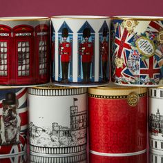 several british themed mugs are stacked on top of each other