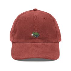 Step up your style with an embroidered old-school cap. It's crafted from 100% cotton corduroy that's soft to the touch and comfy to wear. It features an adjustable strap with a gold-colored buckle for a great fit and a visor to protect you from the sun and wind. Complete your look with this embroidered corduroy cap and rock a cool vibe all day long. * 100% cotton corduroy * Unstructured, 6-panel, low-profile * Cotton twill sweatband and taping * 6 embroidered eyelets * Adjustable strap with a gold-colored metal buckle * Head circumference: 20″-22″ (50.8 cm-56 cm) This product is made especially for you as soon as you place an order, which is why it takes us a bit longer to deliver it to you. Making products on demand instead of in bulk helps reduce overproduction, so thank you for making t Casual Corduroy Baseball Cap With Curved Bill, Casual Corduroy Hat With Curved Bill, Casual Corduroy Snapback Baseball Cap, Casual Corduroy Flat Cap, Corduroy Baseball Cap With Embroidered Logo, Adjustable Corduroy Baseball Cap, Adjustable Corduroy Baseball Cap (dad Hat), Adjustable Corduroy Dad Hat Baseball Cap, Casual Adjustable Corduroy Baseball Cap