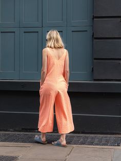 Shipping by the end of this week! Why me? Liven up your wardrobe with this wild Wild Clouds X Percy Langley Neon Orange Cotton Culotte Jumpsuit! Made in London from killer seersucker gingham fabric, this jumpsuit adds a playful touch with its neon orange colour and wide culotte style leg. Complete with an elegant shape, it's perfect for any occasion. Culotte Style, Why Me, Culotte Jumpsuit, Orange Colour, Gingham Fabric, Galaxy Print, Neon Orange, British Indian, Mix Match