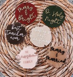 four handmade christmas ornament hanging from a wicker basket