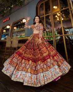 PRESENTING NEW DESIGNER PRINTED LAHENGA CHOLI Featuring printed lehenga choli in heavy Butter silk . Quality is worth paying👌 # FABRIC DETAILS # LEHENGA :  HEAVY BUTTER SILK WITH *REAL MIRROR WORK *   &. * 4 MTR FLAIR  FULLY STITCH)*   # INNER : SILK # CHOLI         :  SOFT BUTTER SILK & *REAL MIRROR WORK*  (1.20 MTR FABRIC) # DUPATTA   :  HEAVY BUTTER SILK WITH * REAL MIRROR WORK*  # FREE SIZE FULLY STITCHED  LAHENGA WITH UN STITCH 1.20 MTR BLOUSE ; LAHENGA LENGTH IS 44 INCHES ;   (*weight: 1 Bridal Garba Chaniya Choli, Gujarati Chaniya Choli Designs, Garba Bridal Outfit, Bride Garba Outfit, Garba Ghagra Choli, Annus Creation Chaniya Choli, Gujrati Ghagra, Gujrati Lehenga Choli For Wedding, Rajasthani Ghagra Choli