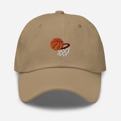 Elevate your sports style with the Basketball Embroidered Dad Hat, where athletic design meets comfort and versatility. 🏀 🧵 Product Details: Material: Crafted from 100% cotton twill, ensuring a soft and comfortable feel. * Design: Showcases a bold basketball embroidered motif, expressing your love for the game and athletic spirit. * Style: Features an unstructured, 6-panel, low-profile design, offering a laid-back and sporty aesthetic. * Ventilation: Designed with 6 embroidered eyelets to prov Sporty Aesthetic, Style Sportif, Des Baskets, Sports Style, Slam Dunk, Profile Design, Athletic Fashion, Dad Hat, Sport Fashion