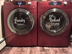 two red washers sitting next to each other on top of a wooden floor in front of a dryer