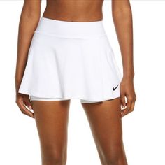 Sporty Style Meets High-Performance Design In This Powerhouse Skort Cut From Sweat-Wicking Dri-Fit Stretch Fabric To Keep You Cool And Comfortable. A Swingy Silhouette Lets You Move Naturally, While Sleek Inner Shorts Provide Coverage And Support You Need From The Pickleball Court To The Tennis Court. 13" Length; 4" Inseam; 16 1/2" Leg Opening (Size Medium) Elastic Waist Built-In Shorts Dri-Fit Moisture-Wicking Technology 88% Polyester, 12% Spandex Machine Wash, Tumble Dry Imported Item # 662574 White Short Tennis Skirt For Sports, White Short Length Tennis Skirt For Sports, Fitted White Nike Tennis Skirt, Nike White Skort For Spring, Nike White Fitted Tennis Skirt, Nike White Tennis Skirt For Spring, Nike Fitted Sporty Skort, Fitted White Tennis Shorts, Fitted White Tennis Bottoms