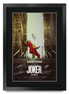 an autographed photo of the joker movie character signed by actor jojoaun phoenix