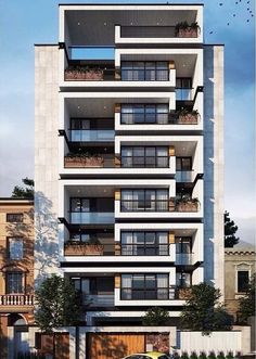 an apartment building with balconies and plants on the balconies is shown