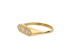 Exuding an air of understated elegance and quiet sophistication, this Zoë Chicco ring is a perfect option for the jewelry lover who is just starting to build their fine jewelry collection. Four diamonds, a round, a marquise, a pear and a princess are set into the brushed 14K yellow gold bar at the center of a high polished 14K yellow gold band. Quietly cool on its own, this ring also looks great stacked with your other Zoë Chicco favorites. white diamonds : 4 : vary : 2mm diameter to 4mm x 2mm e Modern Marquise Ring For Formal Occasions, Timeless Marquise Promise Ring, Modern Marquise Rings With Vvs Clarity, Modern Marquise Diamond Ring With Vvs Clarity, Heirloom Marquise Diamond Promise Ring, Minimalist Marquise Cut Rings For Formal Occasions, Modern Marquise Diamond Ring For Formal Occasions, Formal Marquise Diamond Ring With Bezel Setting, Marquise Yellow Gold Signet Ring For Wedding