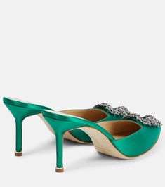 Hangisimu 70 embellished satin mules in green - Manolo Blahnik | Mytheresa Designer Embellished Mules, Luxury Embellished Mules For Party, Luxury Rhinestone Mules For Formal Occasions, Luxury Embellished Mules For Evening, Chic Formal Mules With Rhinestones, Chic Rhinestones Mules For Formal Occasions, Luxury Embellished Evening Mules, Chic Embellished Evening Mules, Elegant Green Mules For Evening