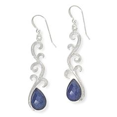 Jay King Sterling Silver Tanzanite Drop Earrings  These handcrafted, sterling silver earrings feature beautiful blue tanzanite stones in a chic, scrollwork design that's sure to add artistic flourish to any outfit! From Jay King.       Approx. 2-3/16"L x 3/8"W     Stamped .925     Pierced with wire backs     Sterling silver earring drops have bezel-set, pear-shaped, checkerboard-faceted blue tanzanite stone topped with silver scroll work design   Stone Information       All sizes and weights approximate     Stabilized Clarity-Enhanced Tanzanite - Pear (8x12mm); mined in Tanzania Sterling Silver Blue Earrings With Intricate Design, Blue Sterling Silver Earrings With Intricate Design, Silver Tanzanite Drop Earrings, Elegant Silver Tanzanite Earrings, Tanzanite Drop Earrings, Jewelry King, Tanzanite Stone, Blue Tanzanite, Stone Top