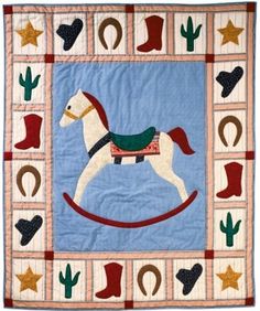 a quilt with a rocking horse on it