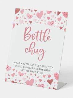 a card with hearts and the words bottle chug written in pink ink on it