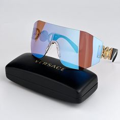 New Versace Ve2258 1002ma Pink Mirrored Blue Shield Unisex Sunglasses Brand: Versace Collection 2023 Model: Ve2258 Color Code: 1002ma Gender: Unisex Frame Color: Pink Mirrored Blue Lens Color: Pink Mirrored Blue Lens Material: Polyamide Frame Shape: Single Lense / Shield Frame Style: Rimless Frame Material: Plastic Size: 145x1x125 100% Uv Protection. Brand New And 100% Authentic! Made In Italy. Full Retail Versace Set Includes: 1. Glasses 2. Case 3. Cleaning Cloth With Brand Logo 4. Versace Booklet 5. Manufacturer Care Instructions 6. Versace Branded Box Same/Next Day Shipping! Versace Medusa Sunglasses, Oversized Aviator Sunglasses, Versace Pink, Blue Shield, Gold Aviator Sunglasses, Blue Lens, Versace Brand, Sunglasses Logo, Versace Collection