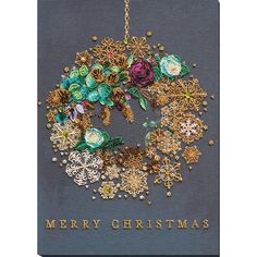 a christmas card with an ornament made out of flowers and snowflakes