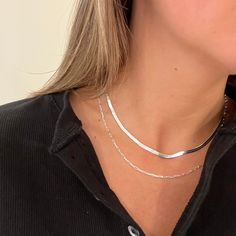 The Como is a 3mm 925 sterling silver herringbone necklace. This necklace is the perfect addition to an outfit with t-shirt and jeans. Pair with the Delilah necklace for a complete silver stack.