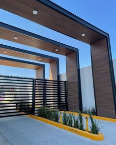 an entrance to a building with wooden slats