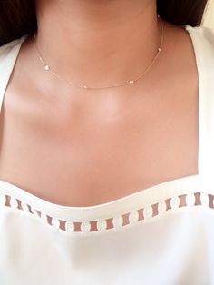 I am so loving the choker trend, especially if it has something sparkly in it. I usually wear them layered with my other choker, but you can surely let it shine on its own. This choker is made of 14k solid gold from the chain to all of its components, while the stones are high quality cz. The size of the stones are about 3mm and they are super dainty, you'll surely love it! - available in 14k yellow gold only. Please send me a message for any questions about this item. All orders above $100 are Dainty Gold Station Necklace With Diamond Accents, Dainty Diamond Necklace With Delicate Chain, Dainty Diamond Jewelry With Satellite Chain, Dainty Diamond Necklace With Satellite Chain, Dainty Diamond Necklace With Bezel Setting, Delicate Diamond Station Necklace, Delicate 14k Gold Station Necklace, Dainty Diamond Station Necklace, Dainty Gold Station Necklace With Bezel Setting