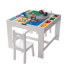 a toy table and chair with cars on it