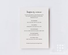 a white wedding program with black writing on it