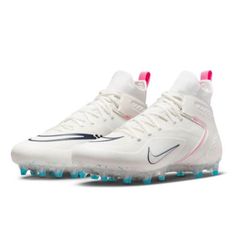 the nike vapor football cleats are white with blue and pink accents on them