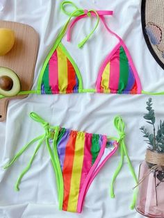 Multicolor Stretch Halter Neck Swimwear, Multicolor Stretch Swimwear T-back, Multicolor Stretch T-back Swimwear, Fitted Striped Color Block Swimwear, Fitted Rainbow Swimwear For Beachwear, Fitted Rainbow Swimwear For Beach Party, Fitted Rainbow Swimwear For Beach Season, Beachwear Swimwear, Push Up Swimsuit