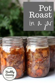 jars filled with food sitting on top of a table