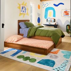 a child's bedroom decorated in bright colors