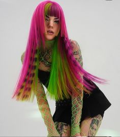 Green And Pink Scene Hair, Candy Corn Hair Color, Pink Purple And Green Hair, Pink Hair With Raccoon Tail, Pink And Green Short Hair, Pink And Teal Hair, Green Hair Dye Ideas, Pink And Green Highlights, Pink Green Hair