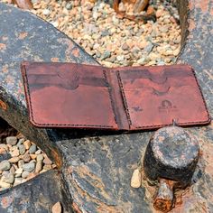 Discover the perfect blend of craftsmanship and style with our handmade bi-fold leather wallet. Each wallet is meticulously hand-stitched and hand-dyed, ensuring a unique and high-quality finish. Whether you're looking for a thoughtful gift or a personal accessory, our leather wallets offer both functionality and elegance. All wallets come with a lifetime repair or replace warranty. Features: Hand Stitched & Hand Dyed: Each wallet is crafted with precision, giving it a unique touch that machine- Clip Wallet, Leather Wallets, Money Clip Wallet, Unique Charms, Hand Stitched, Money Clip, Purse Wallet, Hand Stitching, Hand Dyeing