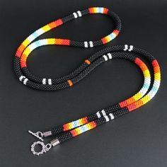 Native American beaded necklace black beaded jewelry for women, anniversary gift for grandma, aboriginal totemATTENTION* I have worked out the product packaging , so it will come to you without damage, otherwise you can return itPRODUCT SPECIFICATIONS*SIZE: Lanyard length : 104 cm 41.6 inc* At the ends of the product, metal fittings are stainless steel, will not darken with time. * ! Please be careful with this necklace. Jewelry should be kept out of the reach of children and Pets. Contact with Black Bohemian Beaded Necklaces With Tiny Beads, Hand-strung Black Beaded Necklaces For Festivals, Black Hand-strung Beads As Gift, Black Hand-strung Beads Gift, Black Hand-strung Beaded Necklaces For Festivals, Traditional Black Beaded Bracelets With Tiny Beads, Black Hand-strung Beaded Necklace For Festivals, Festival Hand-strung Black Beaded Necklaces, Festival Black Hand-strung Beaded Necklaces