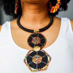 Introducing the Maasai Hexa-Chique Necklace — Turn heads everywhere you go with this stunning, statement Maasai necklace crafted with intricately-beaded Maasai artistry. Showcasing a unique hexagon shaped pendent with multi-colored beading to add that elegant finish touch to any style. Measures 12 inches in length Reference Pics, Necklace Craft, Maasai, Hexagon Shape, Multi Colored, Beading, Beads, Black, Art