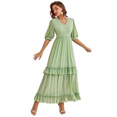 F00154413-202 Green V-neck Dress With Ruffles, Green V-neck Ruffled Dress, Elegant Tiered V-neck Dress For Spring, Green Flowy V-neck Dress, V-neck Ruffled Maxi Dress, V-neck Maxi Dress With Ruffles, Loose Sweater Dress, Red Lace Midi Dress, Ruffled Dress