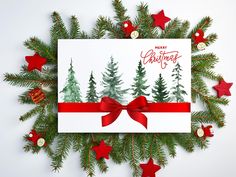 a christmas card with red ribbon and evergreen trees on it, surrounded by star decorations