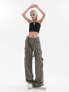 A must-have for a modern woman's streetwear wardrobe. These utility cargo pants are the perfect partner for a crop top, as well as a vast selection of more topwear. With multiple pockets, you'll love the convenience and functionality of these cargo pants.
Gender: Women
Material: Cotton (100%)
Pants Length: Ankle-Length to Full-Length
Waist Type: Mid-Waist Y2k Cargo Jeans For Summer, Y2k Style Cargo Jeans For Summer, Cropped Utility Bottoms For Fall, Fall Cropped Utility Bottoms, Y2k Style Cargo Pants With Pockets For Fall, Casual Cropped Bottoms With Cargo Pockets, Trendy Parachute Pants With Multiple Pockets And Loose Fit, Y2k Summer Parachute Pants With Cargo Pockets, Summer Y2k Parachute Pants With Cargo Pockets