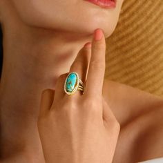 Ross-Simons - Turquoise, 1.30ct t. w. White Topaz Ring in 18kt Yellow Gold Over Sterling. Size 8. An RS exclusive. Bright with an earthy feel, this ring features a 25x11mm oval stabilized turquoise cabochon in marbled blue and green hues framed and sided by sparkling 1.30 ct. t. w. white topaz rounds. Set on a glowing band of polished 18kt yellow gold over sterling silver. 1 1/8" wide. Due to the nature of the turquoise, colors in each unique piece will vary. White topaz and turquoise ring. Gems Rings, Green Hues, Gem Ring, Topaz Ring, White Topaz, Blue And Green, Turquoise Ring, Unique Pieces, Topaz