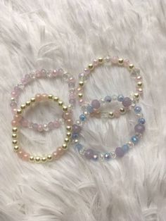 Handmade crystal and/or pearl jewelry for reborn babies. You can choose the bracelets sizes from 2.5 -4.5 inches in diameter. 2.5 fits micro preemie  3.5 fits preemie 4  fits newborn  5 or 6 inch fits  the reborn Mama. If you choose this option just message me to customize your wrist size. This listing includes  1 Handmade bracelet. Handmade Pearl Crystal Bracelet With Round Beads, Cute Pink Jewelry With Spacer Beads, Cute Spacer Beads For Jewelry Making, Beaded Bracelets With Round Beads, Handmade Pearl Crystal Bracelet As Gift, Hypoallergenic Pearl Jewelry For Birthdays, Pearl Bracelets For Birthday, Pearl Bracelets With Round Beads For Birthday, Pearl Bracelet With Round Beads For Birthday