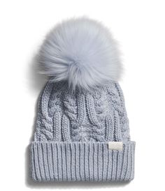 PRICES MAY VARY. WINTER CLASSIC. The Women's Oh Mega Fur Pom Beanie now features a body made from recycled polyester yarn, an oversized faux fur pom and updated cabling for a refreshing look. DEEP FIT. Made with a roomier fit that keeps your head warm in the cold, this beanie is perfect for easy wear or bundling up. Whether for a casual look in town or active days in the wilderness, you'll love the stylish look this hat brings to any outfit. RECYCLED FABRIC. Made from 100% recycled polyester, th Womens Bobble Hat, Knitting Patterns Free Hats Women Cable, Free Cable Knit Hat, Aritzia Toque, Dusty Periwinkle, North Face Hat, Earflap Beanie, Ribbon Logo, Pom Pom Beanie Hat