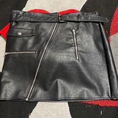 Leather Zipper Skirt From Fashion Nova, Size 2x, Never Been Worn Still Has Tag. Punk Style Skirt With Zipper For Night Out, Black Skirt With Side Zipper For Club, Casual Black Mini Skirt With Side Zipper, Black Mini Skirt With Side Zipper For Club, Edgy Black Skirt With Zip Fly, Black Punk Skirt With Zipper Closure, Punk Style Black Mini Skirt With Zipper, Punk Style Black Mini Skirt With Zipper Closure, Black Punk Mini Skirt With Zipper Closure