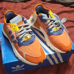 Questions? Leave A Comment Below! Orange Sneakers For Jogging With Round Toe, Orange Round Toe Sneakers For Jogging, Adidas Originals Shoes, Nite Jogger, Adidas Shoes Originals, Leave A Comment, Blue Orange, Adidas Originals, Kids Shoes