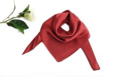 Material: 100% mulberry silk satin Size: 21" x 21" (52cm x 52cm) Product Description This small square silk scarf is made of high quality mulberry silk satin. Smooth touch and feel. Perfect to use as a neck scarf to dress up any formal or casual outfits. Plain red color. Plain Red, Satin Scarf, Square Silk Scarf, Neck Scarf, Silk Crepe, Neck Scarves, Mulberry Silk, Silk Satin, Silk Scarf