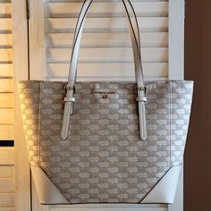 Nwt Michael Michael Kors Large Signature Logo Jacquard Shoulder Bag Color: Lt Cream Multi Size: 14"W X 12"H X 5"D Msrp: $298 Sale: $198 Product Description: Shoulder Bag Logo Jacquard 78.5% Cotton/21.5% Polyester Trim 1: 100% Polyurethane Trim 2: 60% Polyurethane/20% Cotton/20% Polyester Gold-Tone Hardware Handle Drop: 8.75” Adjustable Strap: 21.5”-23.5” Exterior Details: Front Slip Pocket Interior Details: Back Zip And Slip Pockets, 6 Front Slip Pockets Lining: 100% Polyester Zip Fastening Dust Designer Beige Shoulder Bag In Signature Coated Canvas, White Monogram Canvas Shoulder Bag With Branded Hardware, Designer Beige Shoulder Bag In Coated Canvas, Classic Beige Monogram Canvas Shoulder Bag, White Monogram Canvas Bag With Leather Trim, White Monogram Canvas Bags With Leather Trim, Elegant Cream Shoulder Bag In Coated Canvas, Elegant Cream Coated Canvas Shoulder Bag, Classic Cream Monogram Canvas Bag