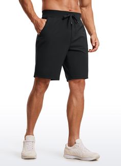 These sports shorts for men are made of lightweight, soft, stretchy, and durable fabric. Elastic waistband and drawstring giving you a personalized fit and prevent shorts from sliding down.Great for training or daily casual wear. Feature & Fitting: 
 On The Travel colletction 
 Design for workout  or running 
 
 Elastic waistband with drawstring 
 Two side pockets & One zip pocket 
 True to size 
 Fabric: 
 Lightweight, soft and durable 
 4-Way stretch 
 Breathable, cool to touch 
 69%Ny Black Training Shorts With Functional Drawstring, Casual Athletic Shorts With Short Inseam For Gym, Casual Black Breathable Swim Trunks, Bermuda Sports Shorts With Elastic Waistband, Black Gym Shorts With Drawstring, Moisture-wicking Knee-length Athletic Shorts, Black Sports Shorts With Functional Drawstring, Black Sportswear Shorts With Functional Drawstring, Black Athletic Shorts With Functional Drawstring